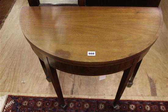 Edwardian mahogany demi-lune card table with folding top